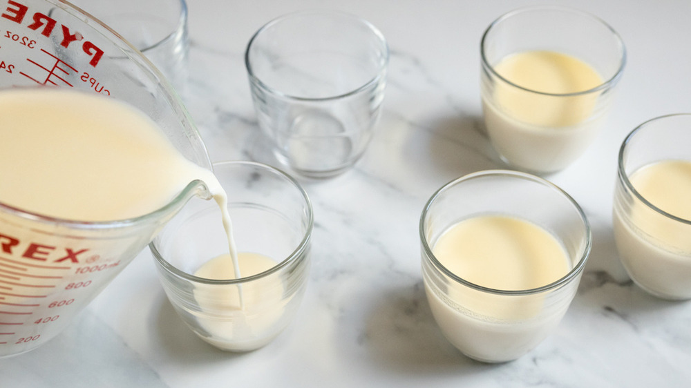 classic panna cotta being portioned