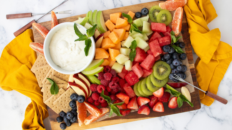Platter with various fruit and marshmallow dip