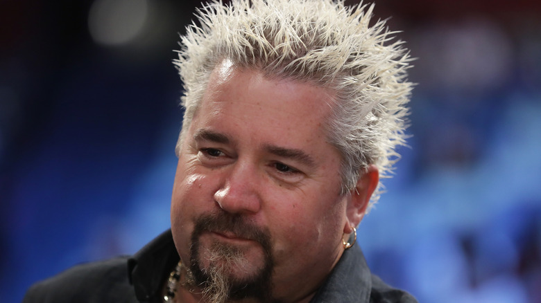 Guy Fieri looking somber