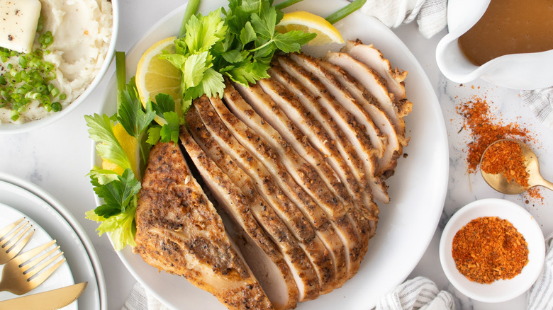 sliced turkey breast on a white plate