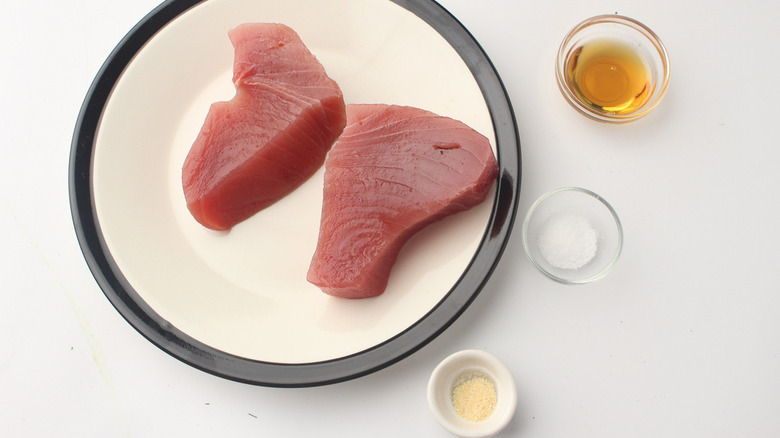 raw tuna, oil, and spices
