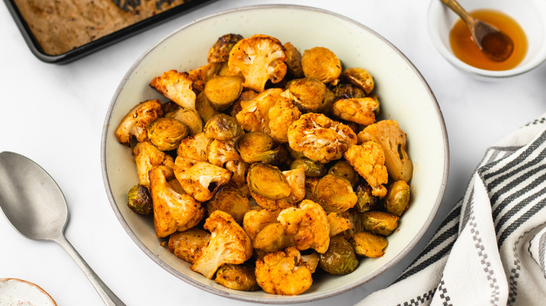 Spicy roasted cauliflower and Brussels sprouts in bowl