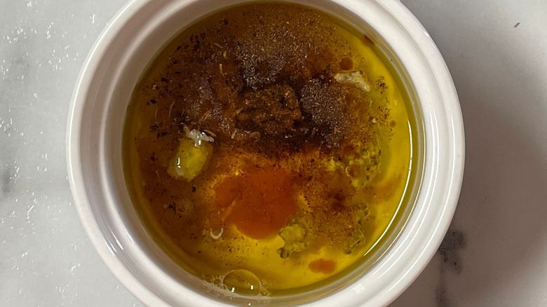Vinaigrette ingredients in white bowl