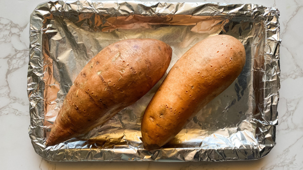 stuffed sweet potatoes on pan