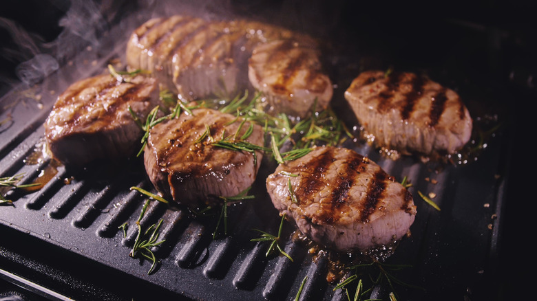 Steak and rosemary on an electric grill