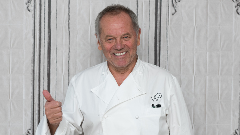 Wolfgang Puck giving the thumbs up